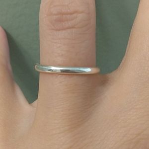 Simple silver band ring